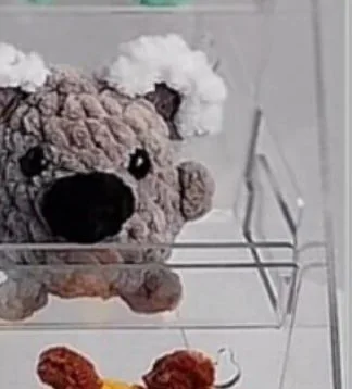 Gray miniature crochet koala with white fluffy ears
